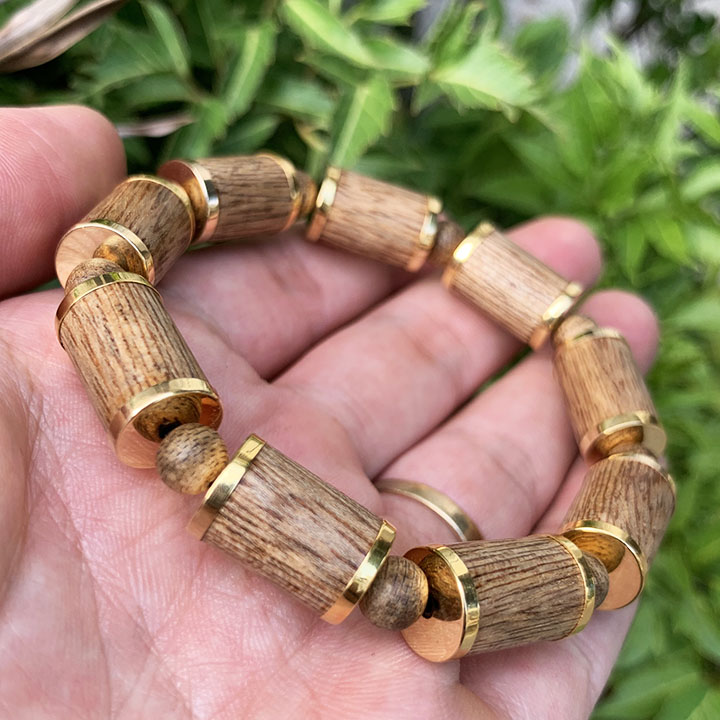 Vòng trầm hương bọc vàng thumb
